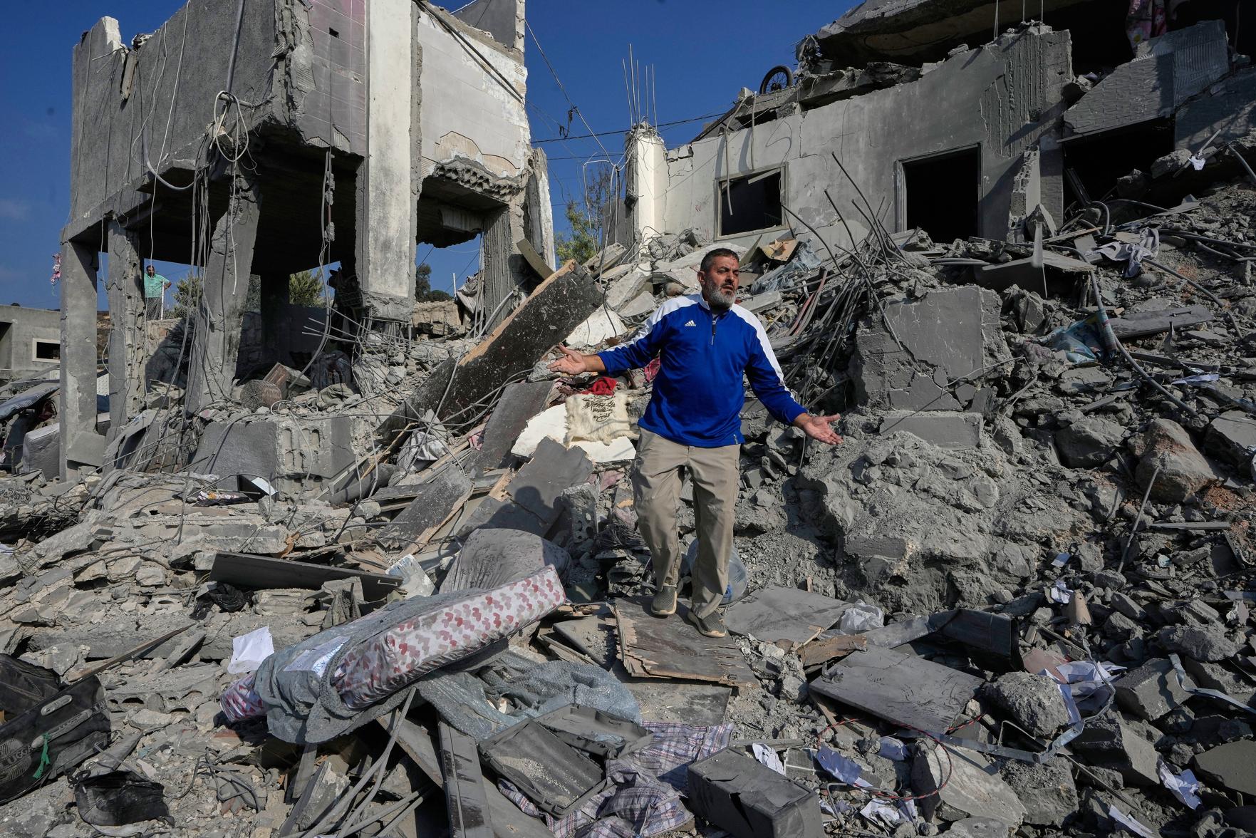 Iran says Qatar is holding pilots as Israeli strikes kill 11 in Lebanon