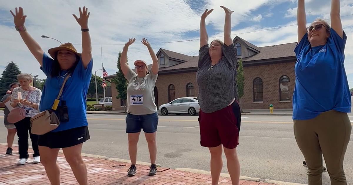 Yoga exercise at UnRun for Literacy