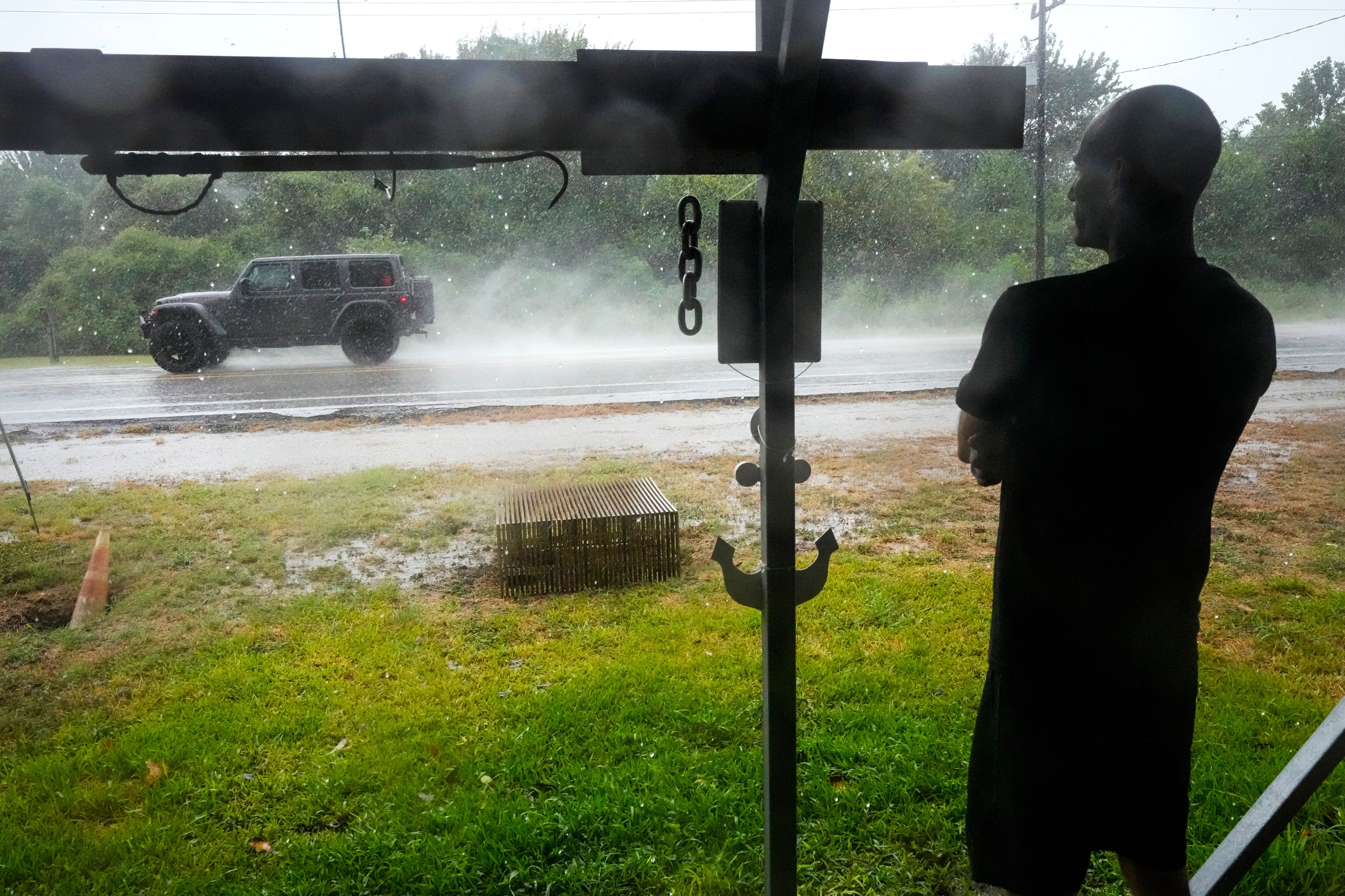 Former Tropical Storm Edouard lingers over Texas, flooding homes
