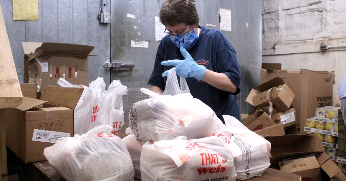 Food bank sees spike in families served | Local News | standard-journal.com