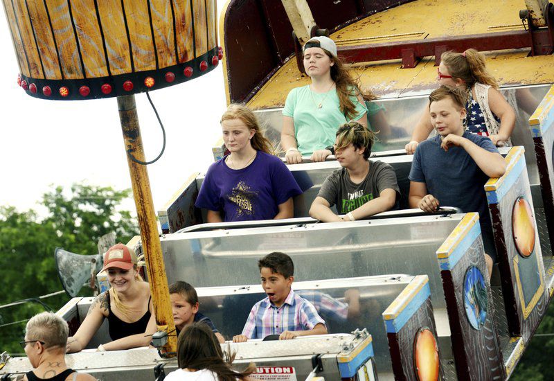 Rooster crowing, harness racing, monster trucks and sunny skies draw crowds to Day 3 of Ashtabula County Fair