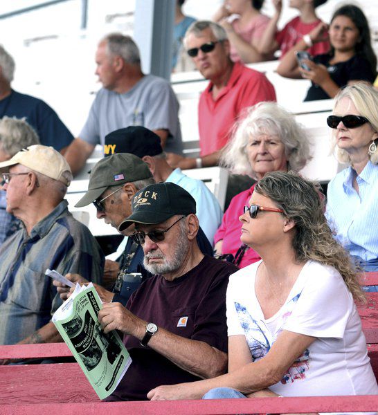 Rooster crowing, harness racing, monster trucks and sunny skies draw crowds to Day 3 of Ashtabula County Fair