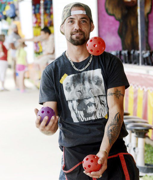 Rooster crowing, harness racing, monster trucks and sunny skies draw crowds to Day 3 of Ashtabula County Fair
