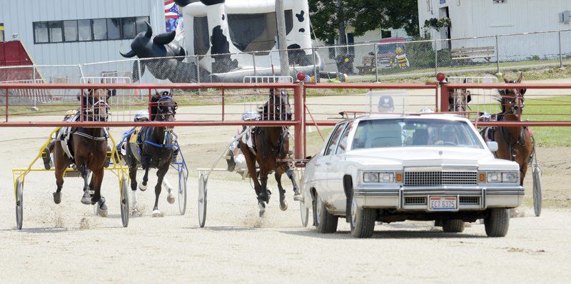 Rooster crowing, harness racing, monster trucks and sunny skies draw crowds to Day 3 of Ashtabula County Fair