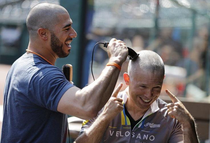 Cleveland Indians players, coaches shave heads to support Mike