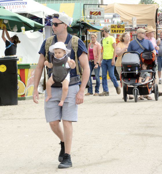 Rooster crowing, harness racing, monster trucks and sunny skies draw crowds to Day 3 of Ashtabula County Fair