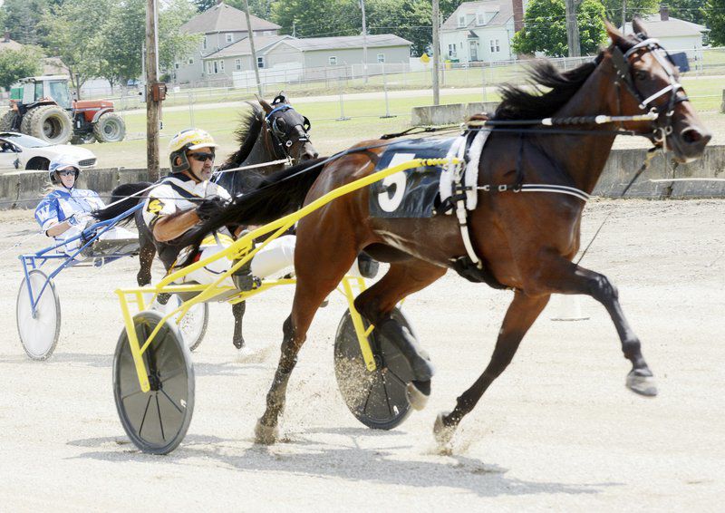 Rooster crowing, harness racing, monster trucks and sunny skies draw crowds to Day 3 of Ashtabula County Fair