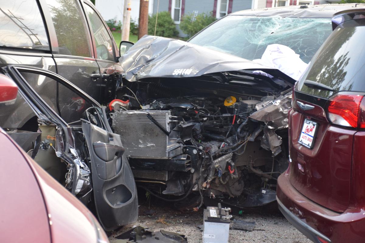 Woman seriously injured after crashing into car dealer lot News