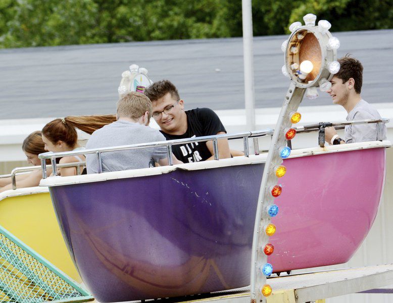 Rooster crowing, harness racing, monster trucks and sunny skies draw crowds to Day 3 of Ashtabula County Fair