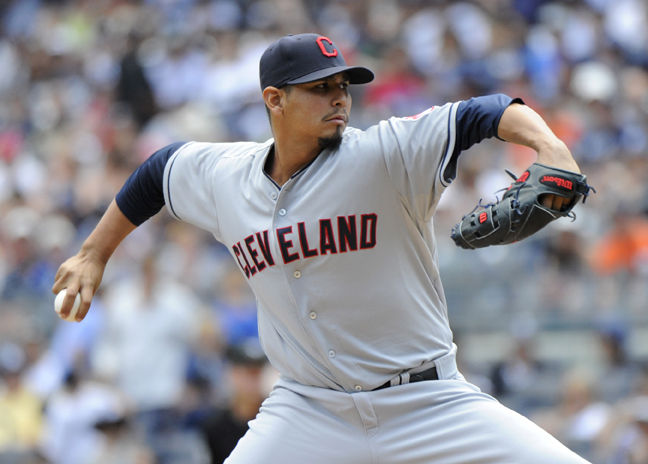 Indians pitcher Carlos Carrasco helps B Kling with weather forecast