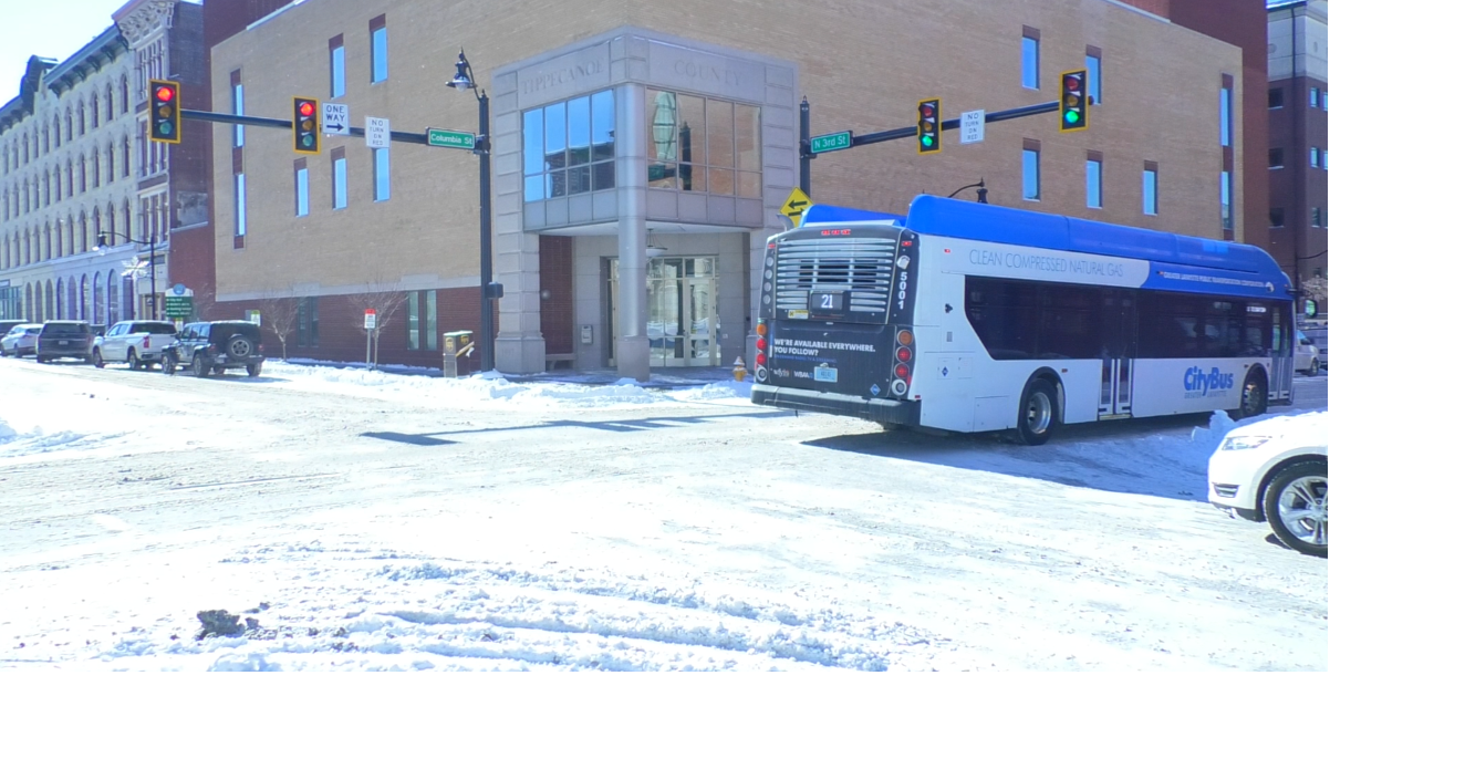 Major snow storm causes travel chaos and forces delays and closings