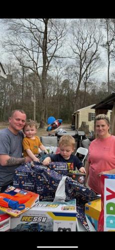 Left to right: Michael Puckett, Mason Puckett, Bentley Puckett and Amber Parenteau.
