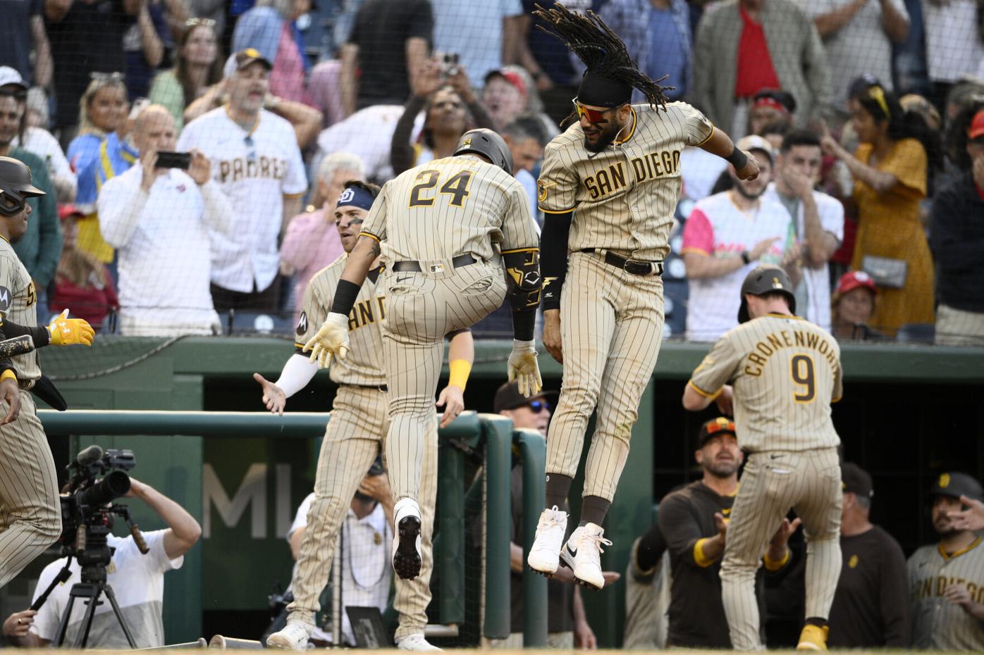 San Diego Padres' Matt Carpenter scores during the second inning