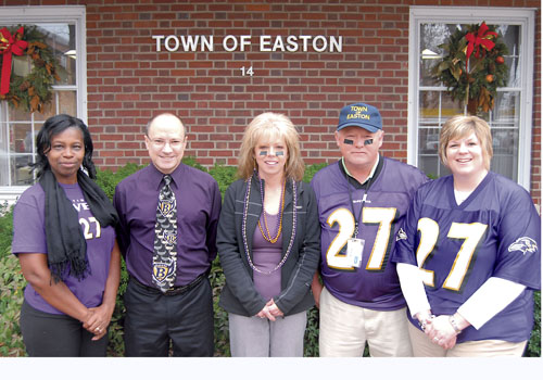 Ravens fans, men and women, wear No 27 for Rice