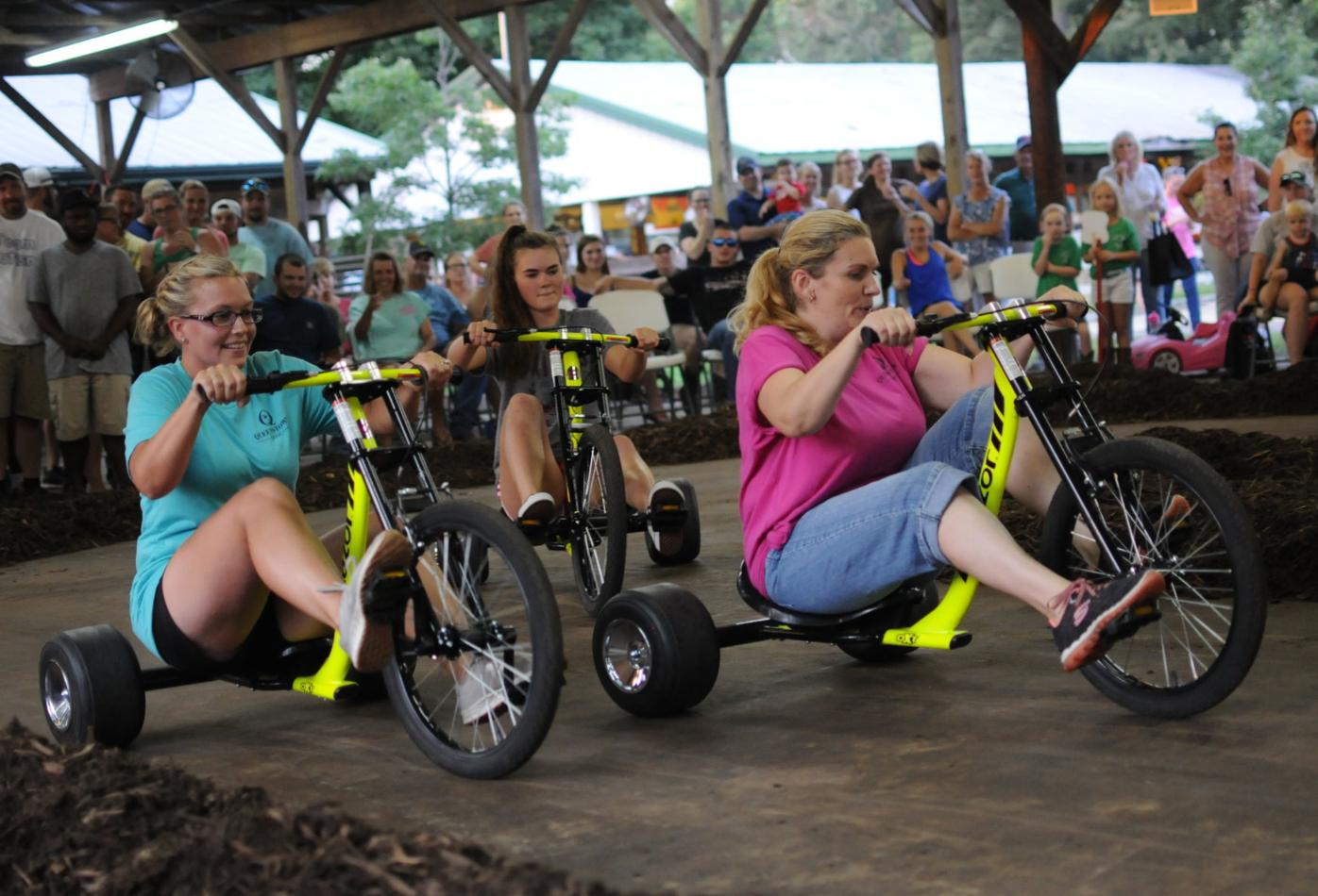 Tricycle race offers thrills and spills Spotlight