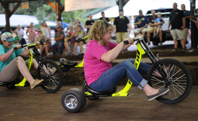 Tricycle race offers thrills and spills Spotlight