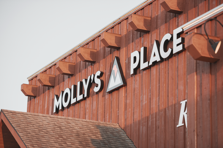 Molly's Place logo.