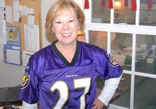 Ravens fans, men and women, wear No 27 for Rice