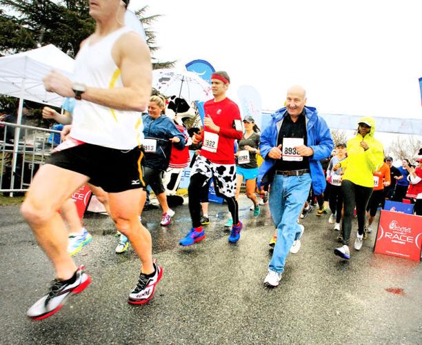 Runners brave rain for Chick-fil-A race | Local | stardem.com