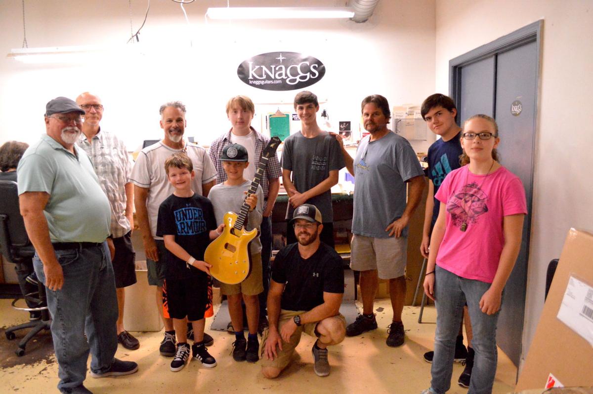 Guitar students tour Greensboro guitar design company Local