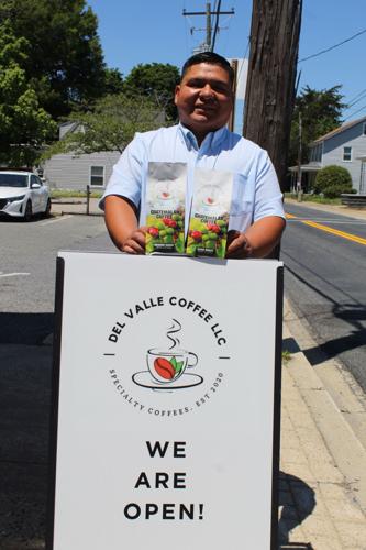 Melvin Del Valle outside of Del Valle Coffee in Greensboro, Maryland.
