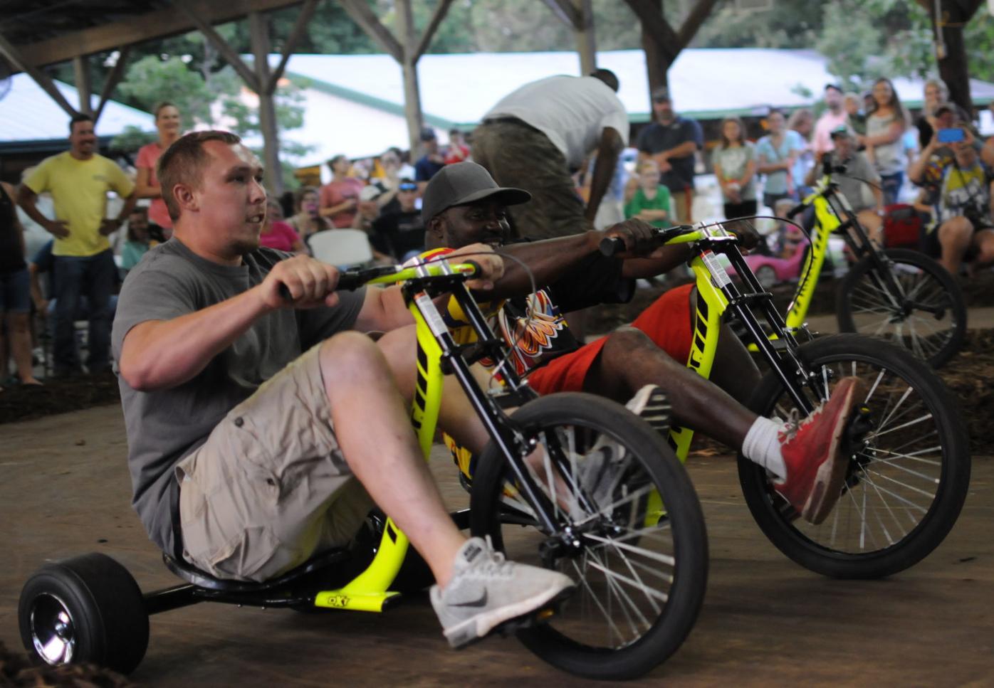 Tricycle race offers thrills and spills Spotlight