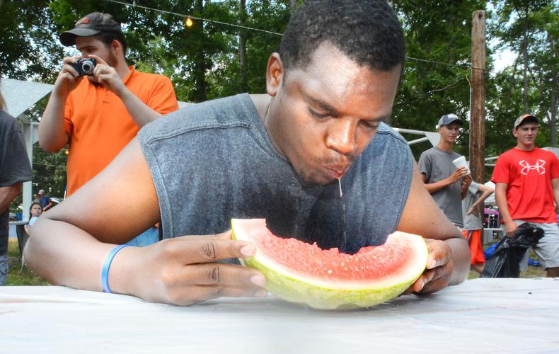 Juice flows at the watermelon eating contest Local