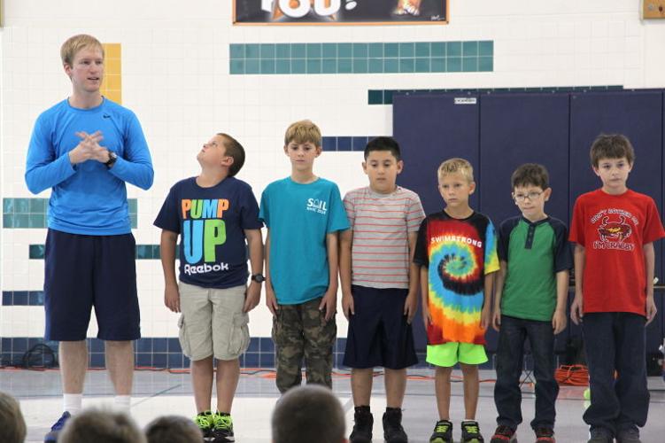 Tilghman Elementary gets a lesson in basketball and character Photos
