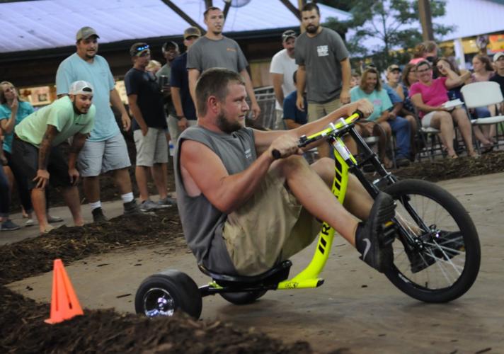 Tricycle race offers thrills and spills Spotlight