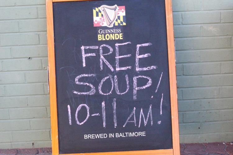 Free soup sign outside of window in Denton.