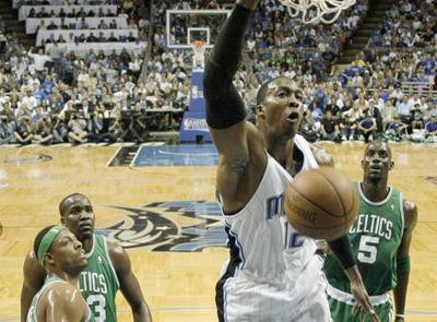 Boston Celtics center Kendrick Perkins (43) blocks the shot of