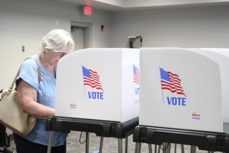 Caroline County resident voting during early election at the Health and Public Services Building.