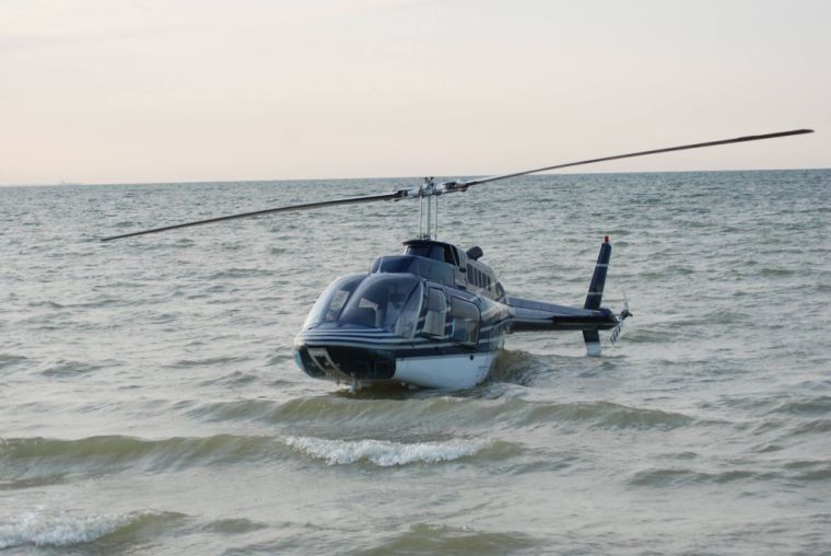 Helicopter lands in water off Taylors Island Local