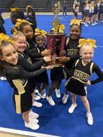 Dorchester Vikings cheer teams win trophies