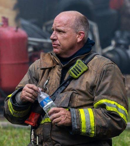 Joe Holland on site of a house fire in Anne Arundel County.