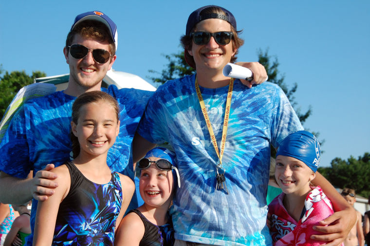 Swimmers converge on Kent Island to kick off summer Photos