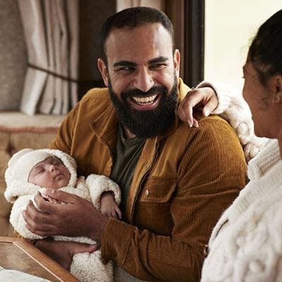 man with baby stock photo