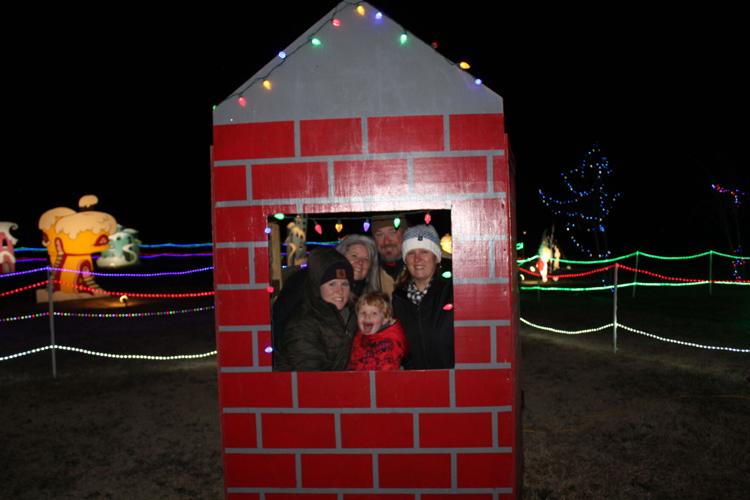Family enjoying Merry and Bright Greensboro Night.