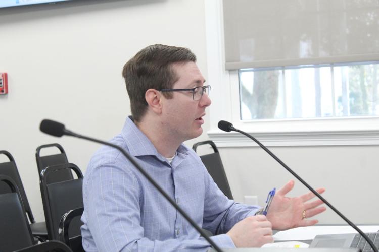 Daniel Fox discussing Fee Schedule adoption for fiscal year 2026.