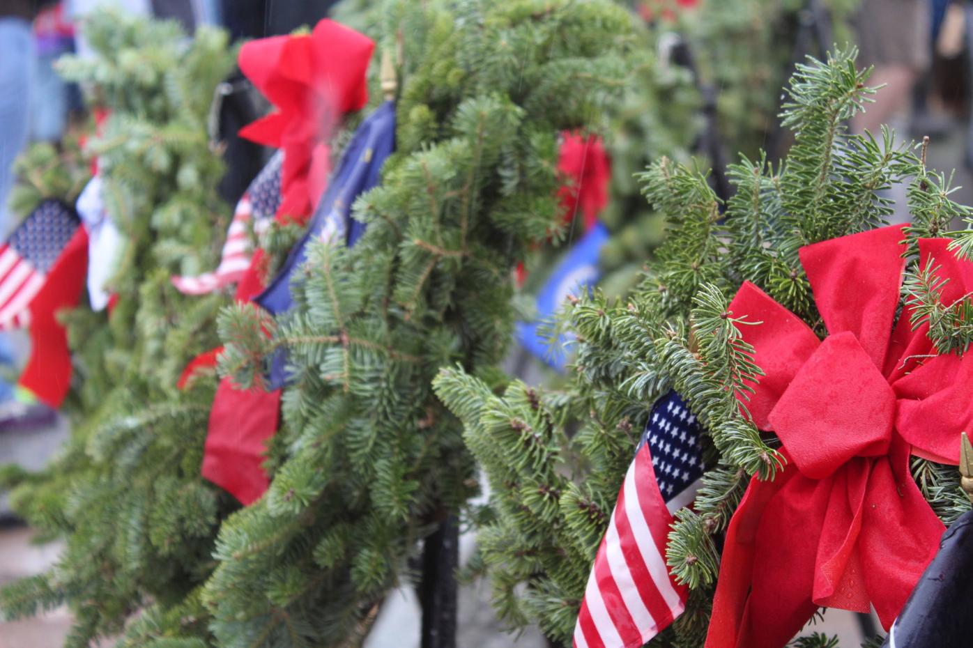 Volunteers lay wreaths at veteran graves Local
