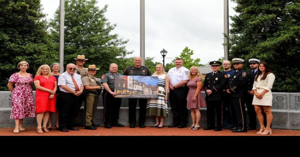 Bluepoint Hospitality presenting 100 'Downtown Easton' gift cards to