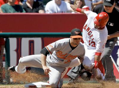 Orioles beat Cubs 7-1, extend winning streak to 10 games