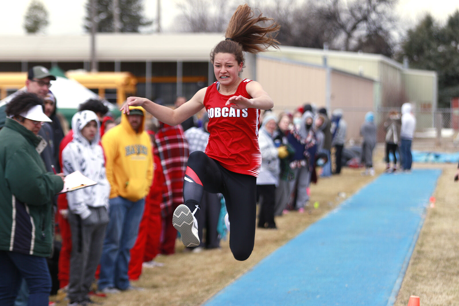 Boys finish seventh, girls relay team takes first at Morrill Early