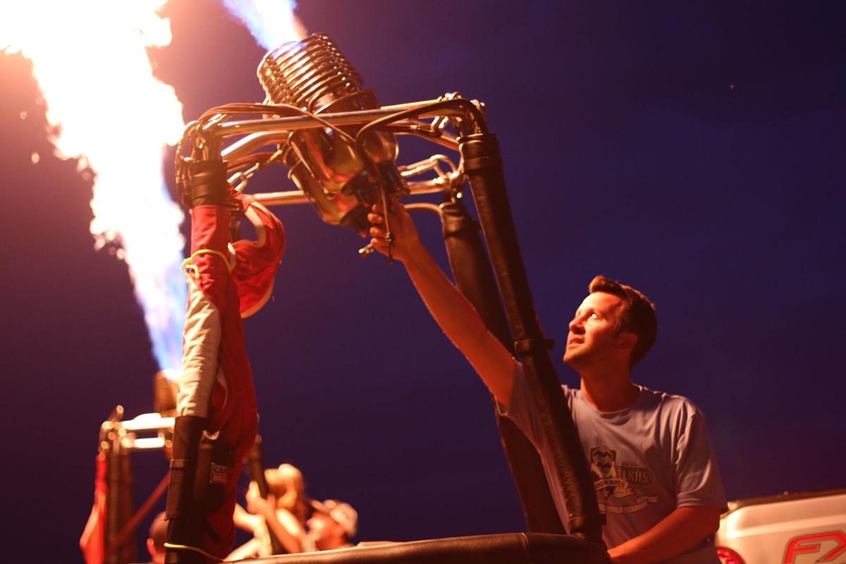 ‘Night Glow’ hits weather snag, spectators still feel the heat