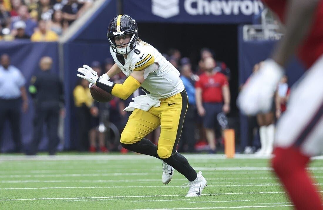 Pittsburgh Steelers quarterback Kenny Pickett looks to pass during