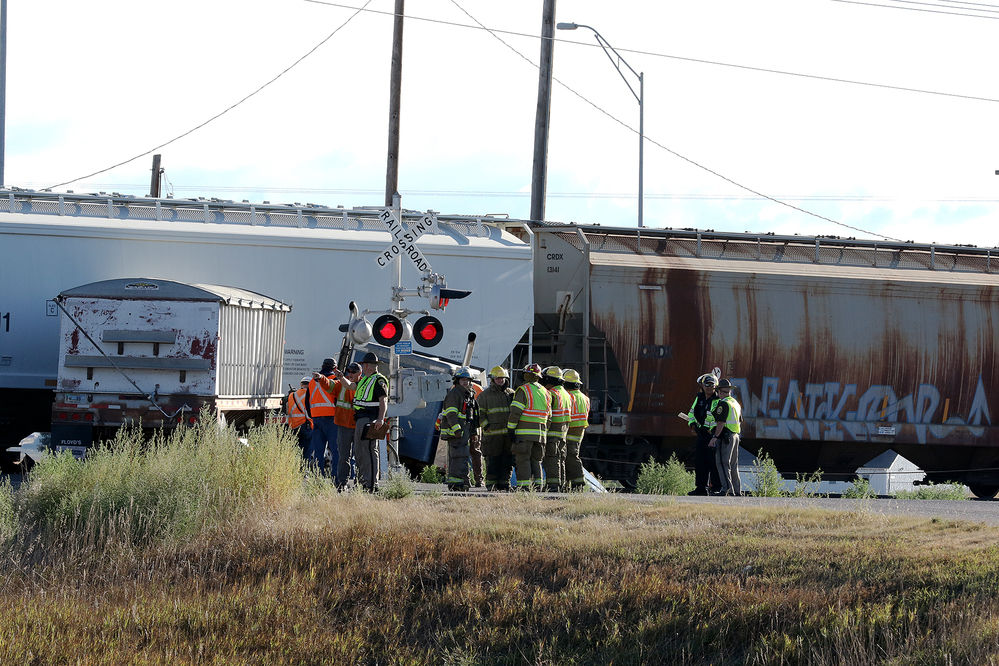 Driver escapes injury, semi totaled in collision with train Local