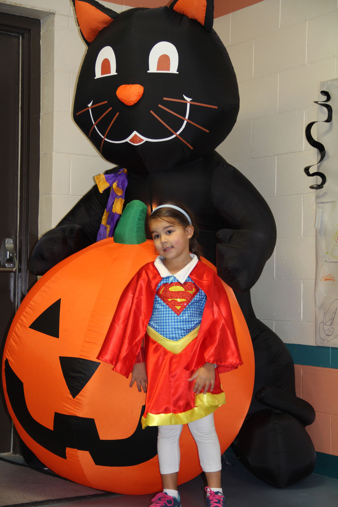 Kids give a Halloween preview during YMCA party Local