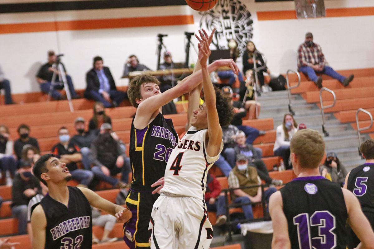 Bridgeport boys weather late Mitchell rally