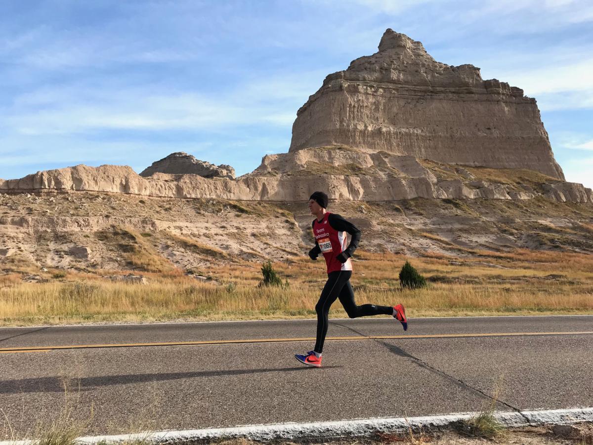 Monument Marathon fullmarathon winner crosses the finish line, sets