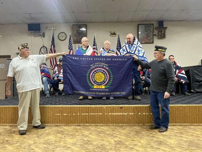 flag with Ray Rockwell, Don Reed, Larry Hansen.jpg